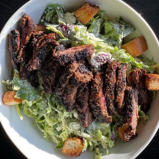 Shaved Brussel Caesar PICTURED WITH BLACKENED SKIRT STEAK.