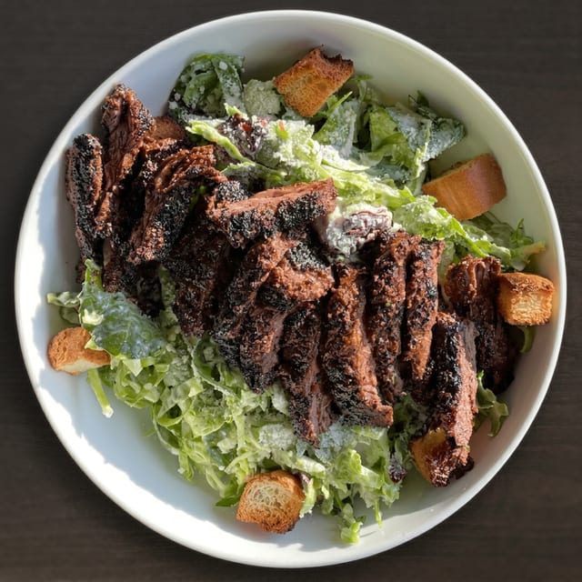 Shaved Brussel Caesar PICTURED WITH BLACKENED SKIRT STEAK.